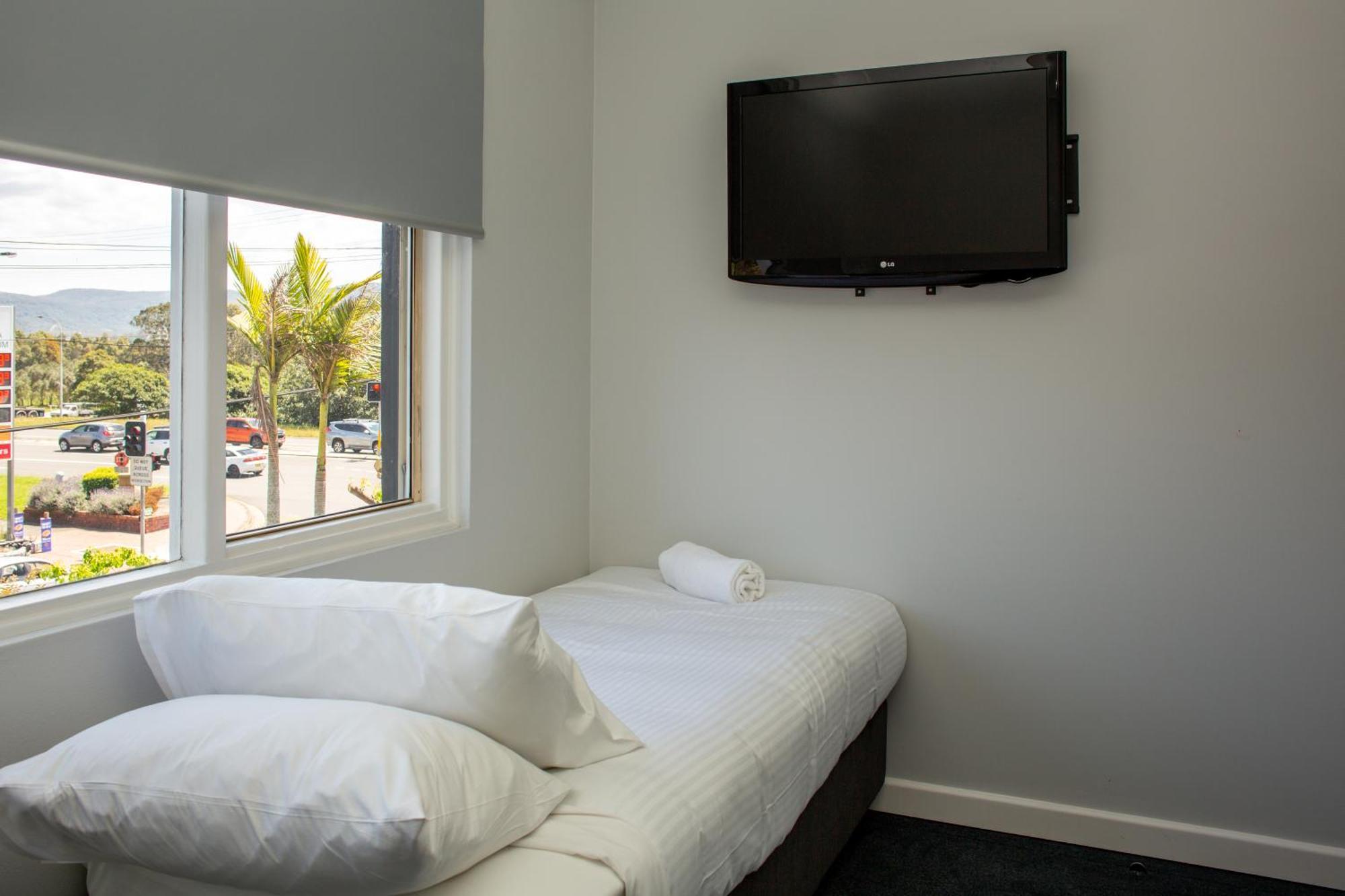Five Island Hotel Cringila Quarto foto